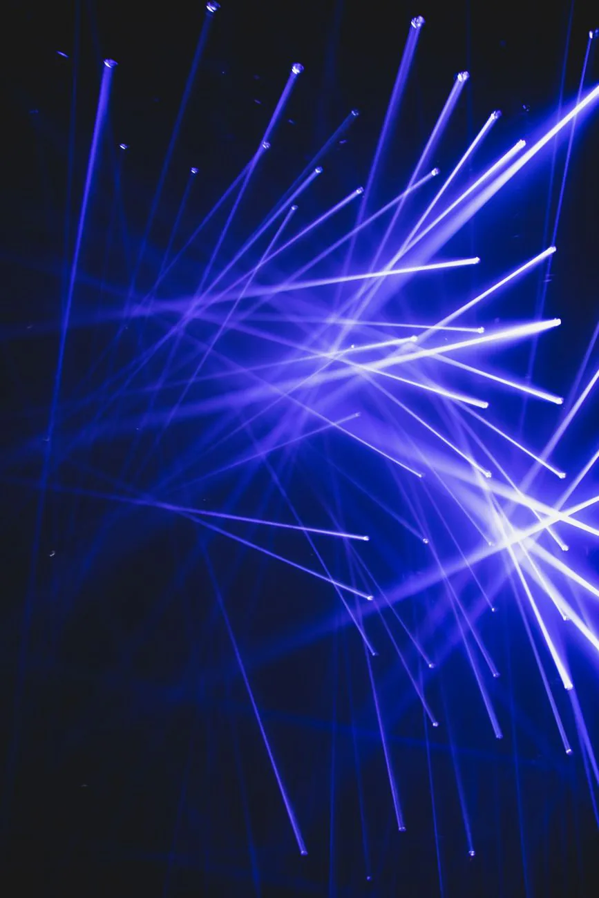 Blue light beams in dark studio